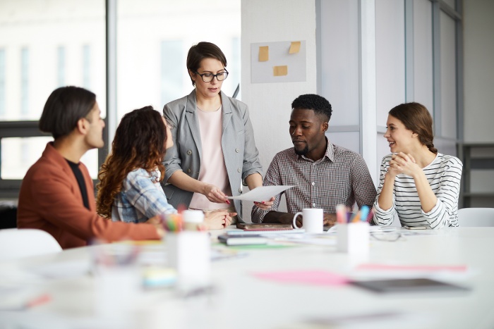 female-manager-working-with-creative-team-1