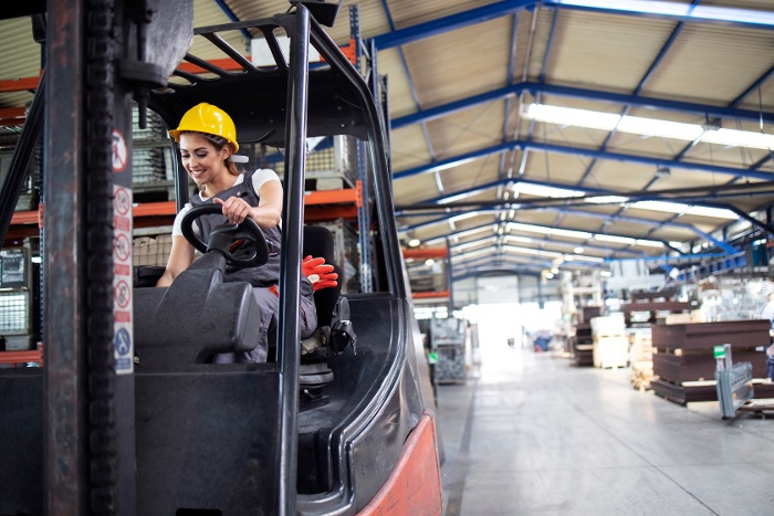 professional-female-industrial-driver-operating-forklift-machine-factory-s-warehouse-1